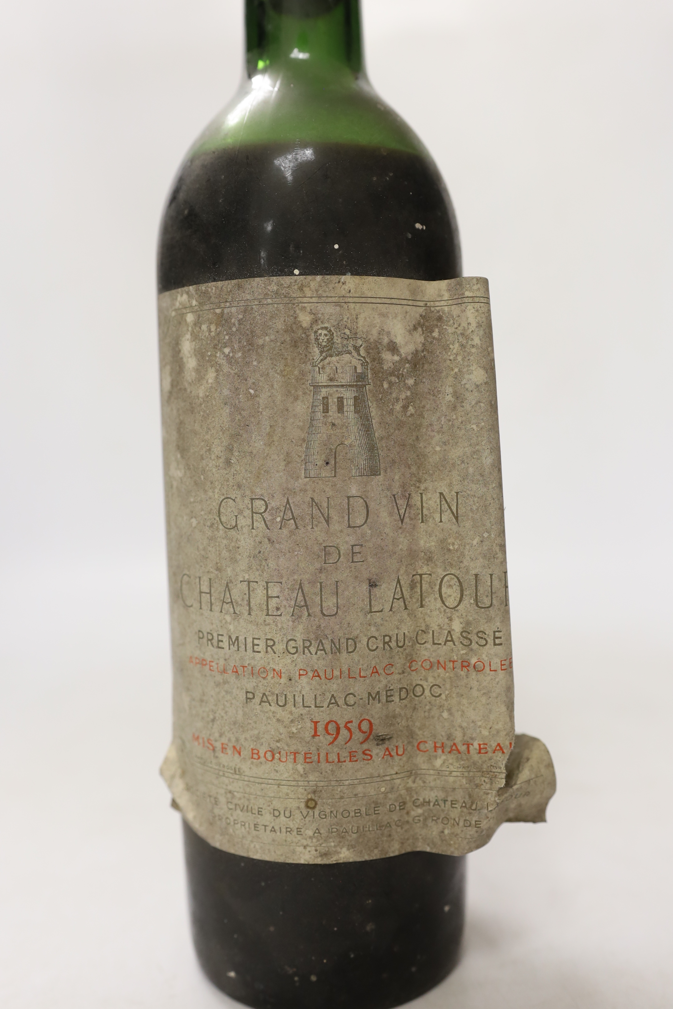 One bottle of 1959 Chateau Latour wine, label damaged